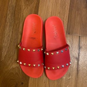 Red slides with gold stones